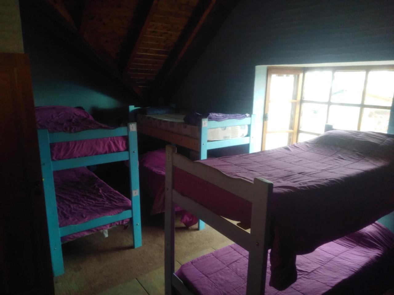Universal Traveller'S Hostel Сан-Карлос-де-Барилоче Экстерьер фото